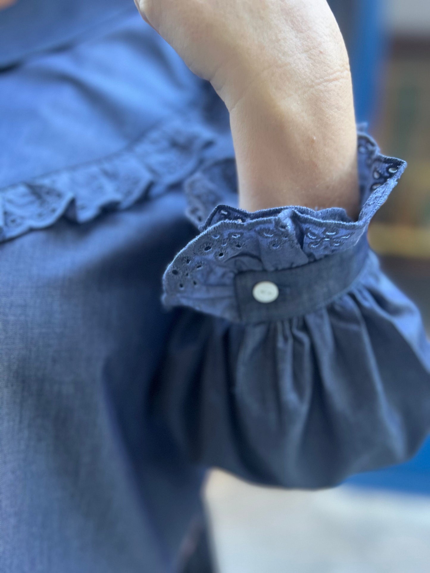 Shirt with blue chambray ruffle and embroidery anglaise sleeve detail